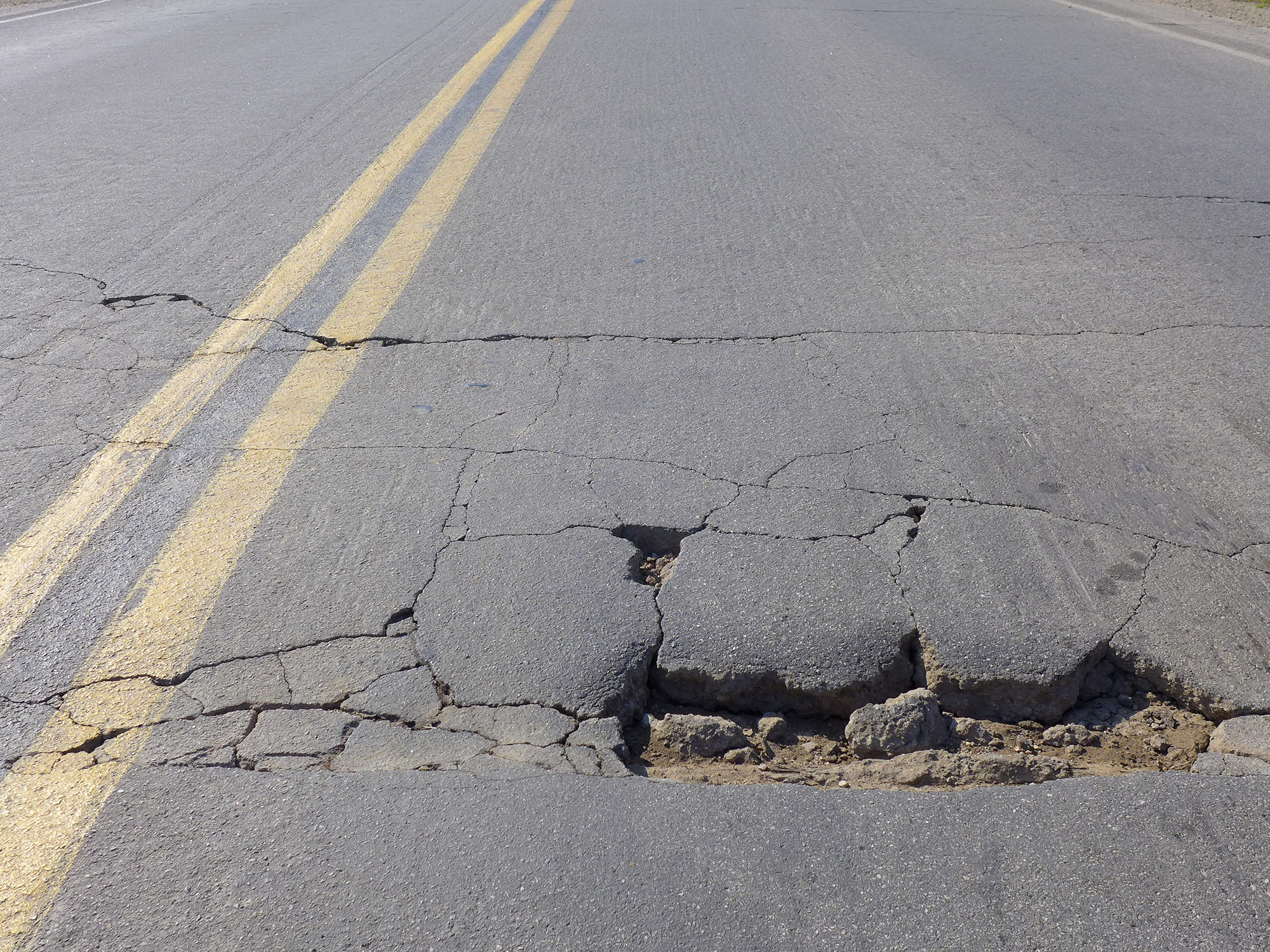 Street Potholes and Crack Filling Services